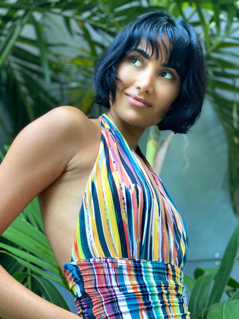 Gorgeous one piece swimsuits and bikinis. Model wears our Eva one-piece swimsuit in the Picasso print. Timeless, sexy and sophisticated.