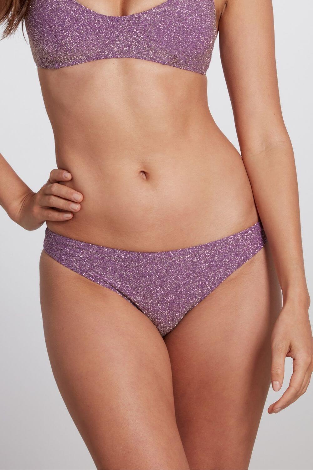 Jenna low rise glittered violet bikini bottom is a classic brief bikini bottom.