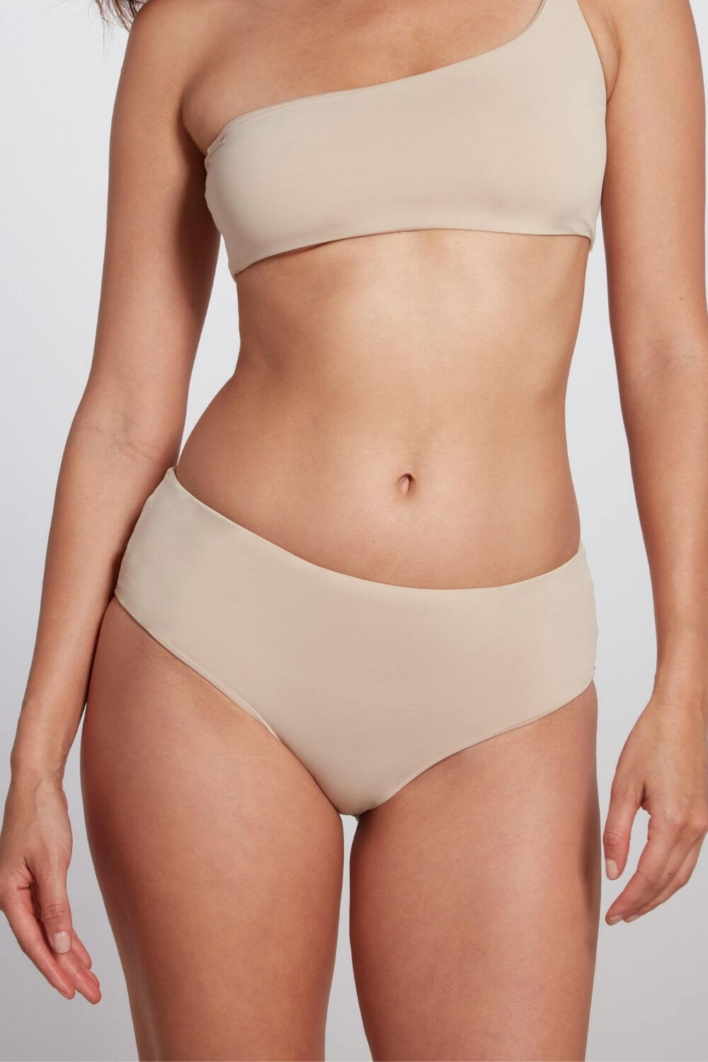 Detail of the mid rise camel bikini bottom Serena.