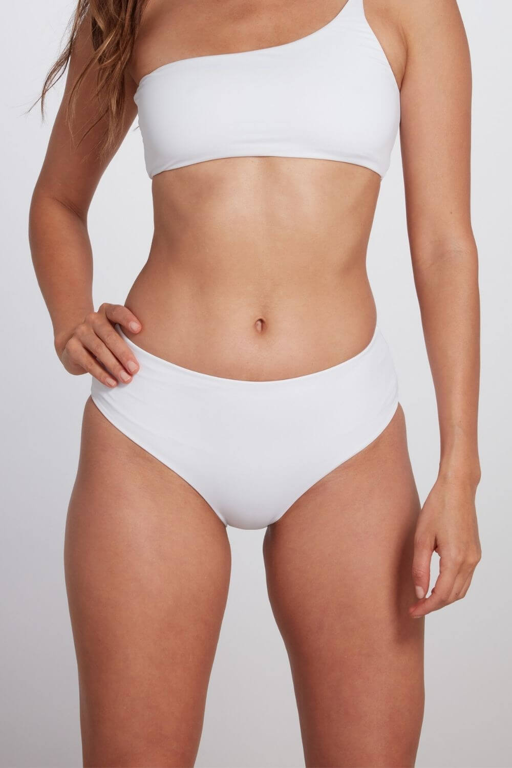 Detail of the Serena white mid rise bikini bottom.