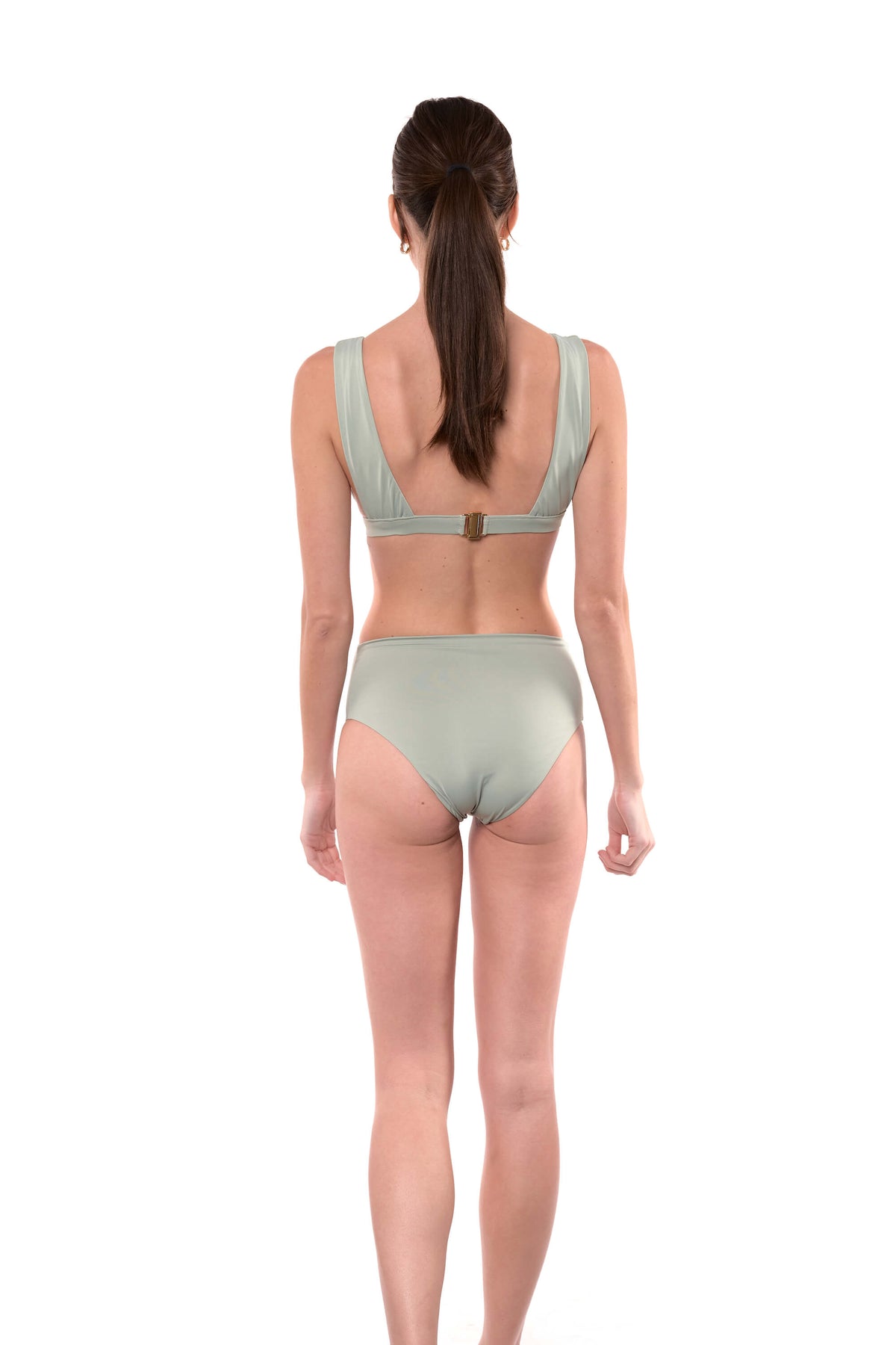 Model shows the back of the Natalie bikini top in sage green