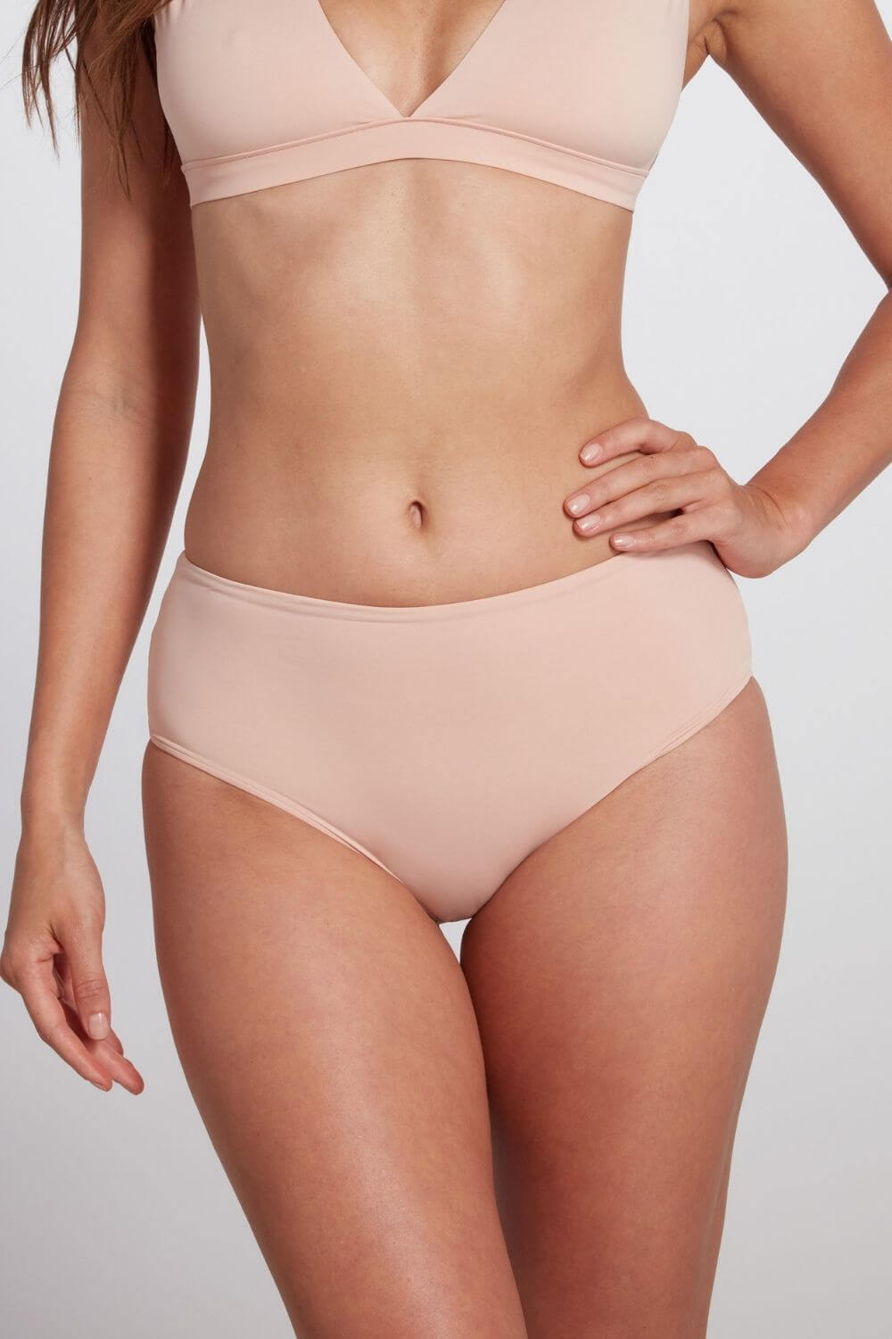 Classic mid-rise bikini bottom in pink blush.